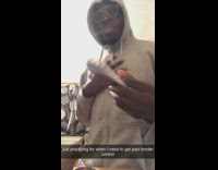 Guy practices giving passport when he gets to border patrol