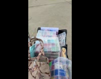 Woman feels defeated dropping container filled beads