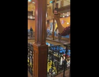 Wax figure boyfriend photographs girlfriend phone