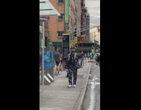 Black suit silver stars guy trump head