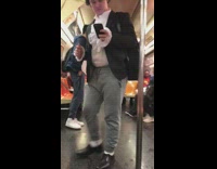 Benjamin franklin halloween costume with kite on subway train