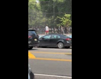 Collab WINY - Two men wave crack whip at park