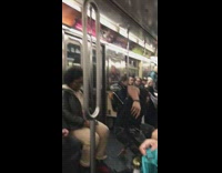 Guy camo pants beard black shrit subway pole