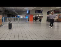 Man dances with jumping rope at airport