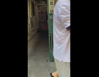 Red megaphone on stairs alerts people for COVID test