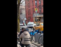 Collab WINY - Man balance tire on head ride bike