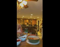 Guy walks into house and helps himself to dinner 