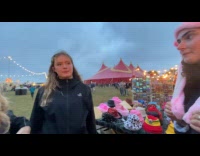 Woman tries rabbit hat with moving eats