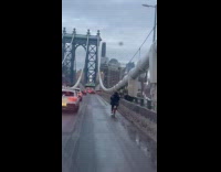 Random person rides bicycle in the bridge