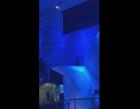 Girl guy stairs blue lights parking lot