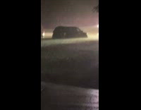 Three cars seen stuck in flooded water 