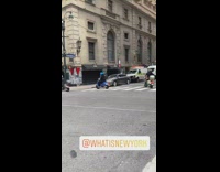 Man on blue bike with cookie monster head