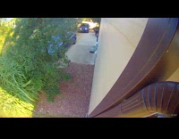 Delivery driver drops package on driveway