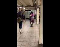 Man with skeleton dance salsa at station