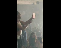 Two girls end of concert sing balcony 