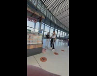 Two girls dance tiktok airport brown circles