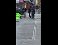 Photoshoot on intersection on neon green couch