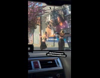 Submitter films two ladies dance at sidewalk