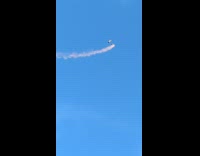 Two skydivers from the sky lands down