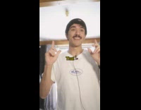 Guy black beanie white shirt acting thats a wrap 