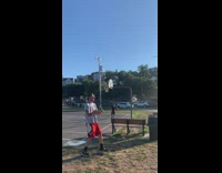 Guy does trick shot jumping off bench behind the back