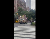 Party school bus with floral decorations driving on the road 
