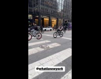 Group ride bicycle do wheelie on street