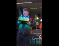 Drunk guys carries beer falls on floor