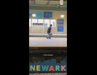 i hate people guy in black shirt blue jeans doing taichi in subway platform