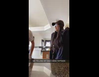 Girl shows dad her tattoos surprise
