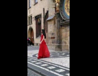 pt 3 woman long red dress old clock 