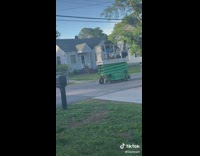 Kids operating a scissor lift by themselves on residential street