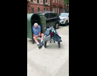 Mailman sits inside mailbox 