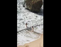 Lady in White Robe Poses at Beach