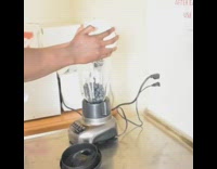 Guy in chef hat and Crippin in the Kitchen apron blends his food and calls his gun a blender