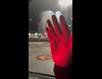Man puts hand on car window leave marks