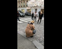 Multiple women street picture building flowers