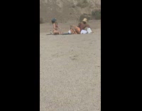Woman brown bikini hat beach two camera