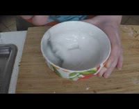 Guy At Kitchen Makes Sugar White Frosting For Brown Muffins