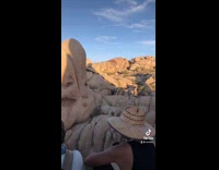 Shadow of couple doing it on rocks