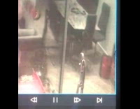 Man walks and hits the glass door caught on the security camera