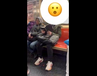 Man read book titled Bury Your Gays subway