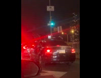 Group sings loud inside car films video