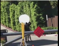 Guy takes selfie with circle sunshade