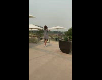 Black face mask girl photographs wine glass