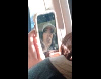 Woman caught takes wacky photo inside car