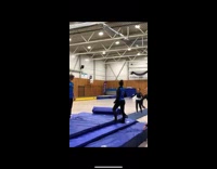 Girl lands on her butt after flipping