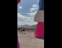 Guys dance high five colorful stacked boulders