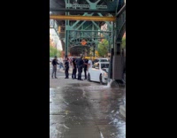 Bridge leaks water crashed by white car