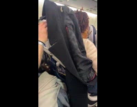 Airplane seat screen of man gets covered